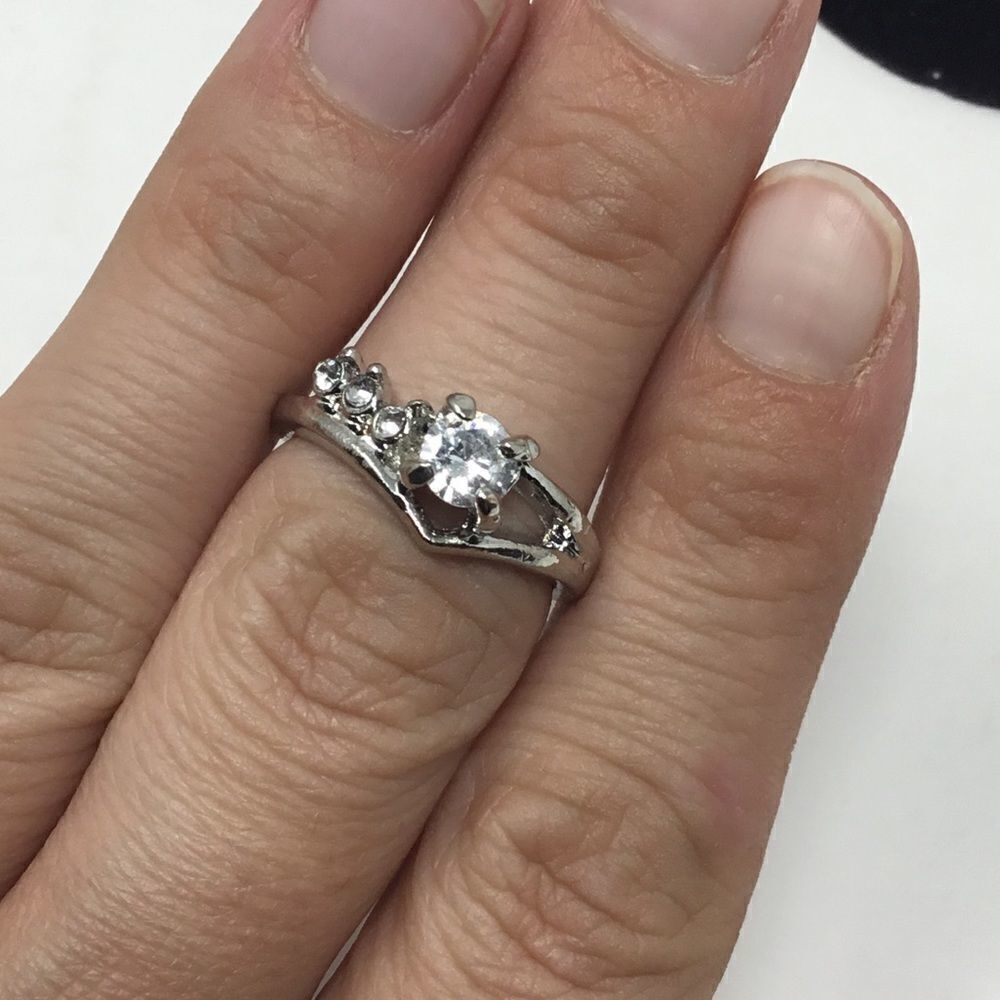 1/2 ct. CZ Fashion Ring in Curved Band (H15)